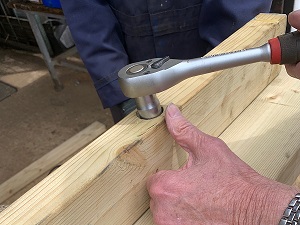 picture of a bolt being fastened